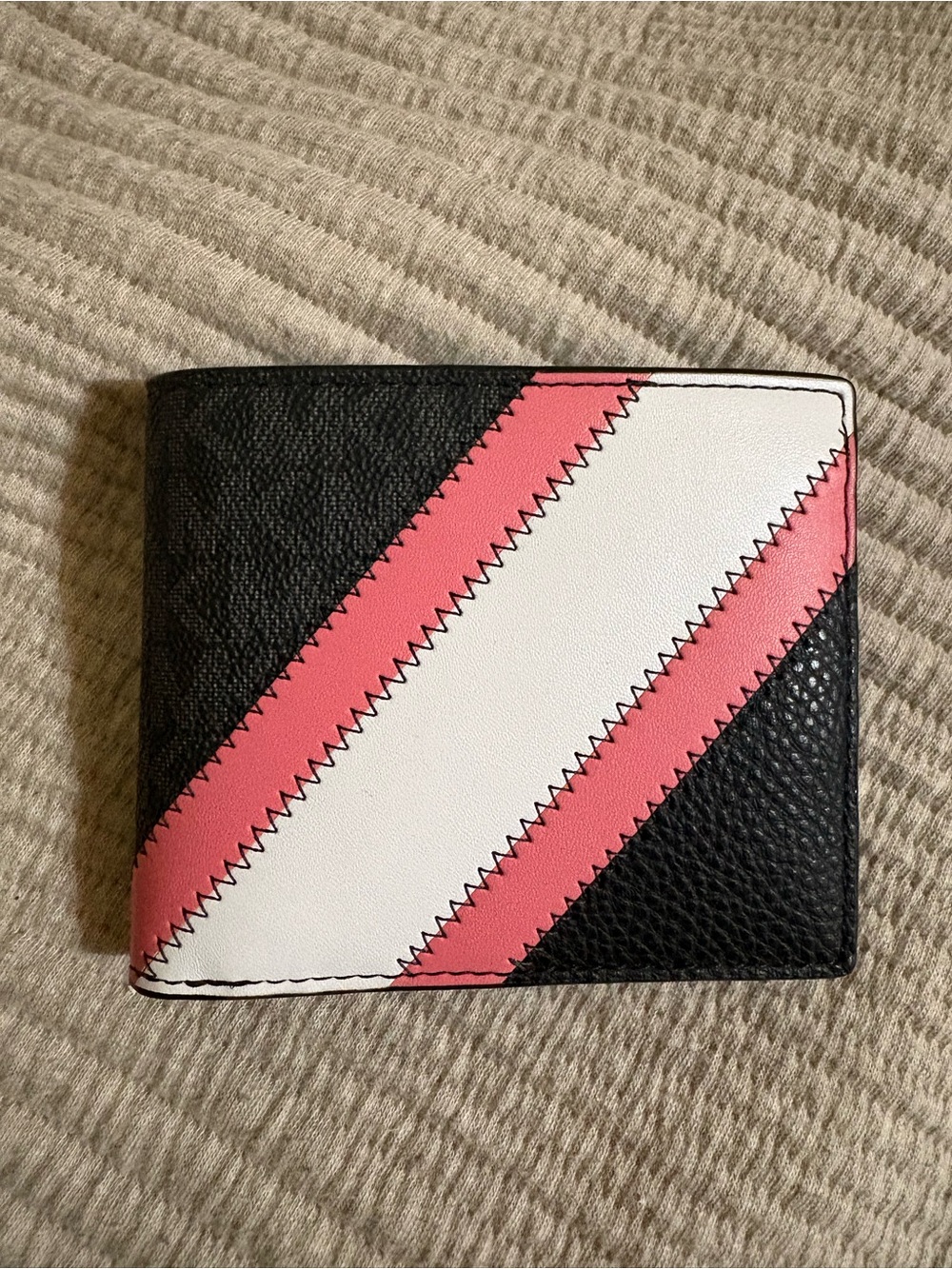 MICHAEL Michael Kors Black Wallet with Pink and White Diagonal Stripes